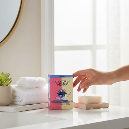 Tia's Treasure Collections Clear Essence Platinum Line antibacterial deodorant bar soap on a wooden soap dish