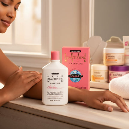 Tia's Treasure Collections Clear Essence Skin Beautifying Milk Maxi-Tone 10 Oz bottle and box. White bottle with pink cap.